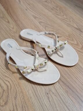 STEVEN New York  Cream Studded Bow Jelly Sandals